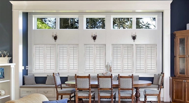 Austin great room with white plantation shutters.